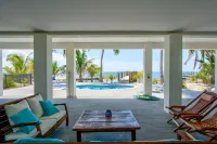 Wide Horizon oceanfront.  4 bedroom, 4 ½ bath,  kayaks, pool + observation deck.