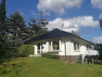 Vacation bungalow with a garden property only 3 minutes away from the beach Hotel a Scharbeutz