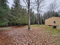 Secluded camp off the snowmobile trail