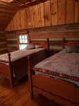 Come to the mountains to a rustic cabin by a creek.