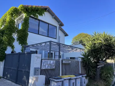 Spacious, cosy air-conditioned apartment in villa with pool near beach and shops