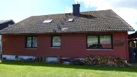 A spacious, family-friendly apartment with a large garden