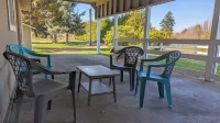 Spacious 2BR house. Pet friendly with fenced yard. Outdoor covered patio.
