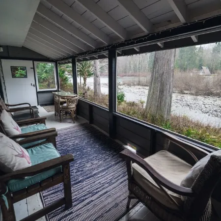 Riverside Mid-Century Cabin with Mountain Views