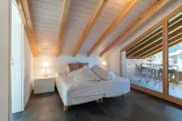 Chalet Apartments Iseltwald Hoteles cerca de Lago de Brienz