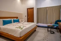 Sportico Resort Bangalore Hoteles cerca de Avani