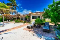 Private Beach Ocean Front Boat Dock Tiki Bar Hotels near Pos Chiquito Beach Park