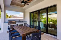 Heated Pool, Full Outdoor Kitchen and Game Room - Luxe Coastal Retreat Hotels in North Naples
