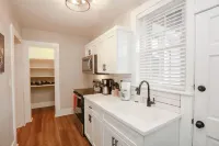 Bright Living Area and Fully Equipped Kitchen - Charming Ground-Floor Retreat