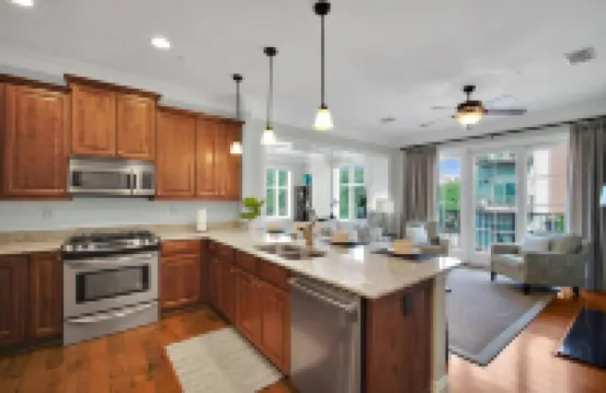 Spacious Condo with Balcony and Southern Charm - Inviting Urban Oasis