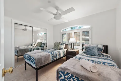 Spacious Deck with Peek-a-Boo Water Views - Exquisite Coastal Haven