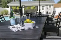 Resort-Style Backyard with Hot Tub and Game Rooms - Charming Lakeside Retreat