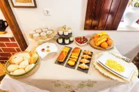 Refúgio Das Artes - servizio colazione