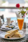 L'escale Appart-hôtel By 7AV HOTELS - 朝食
