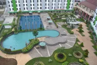 Apartment Green Lake View by Property Time Hotel dekat UNPAM Witana Harja