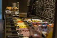 Tri Hotel Premium Criciúma - Bữa sáng