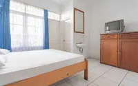 Pall Inn Puncak Mitra RedDoorz