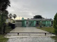 2 minute walk to beautiful beach and great food! Relaxing beach house with pool! Hotels near Little Jim Bridge Park