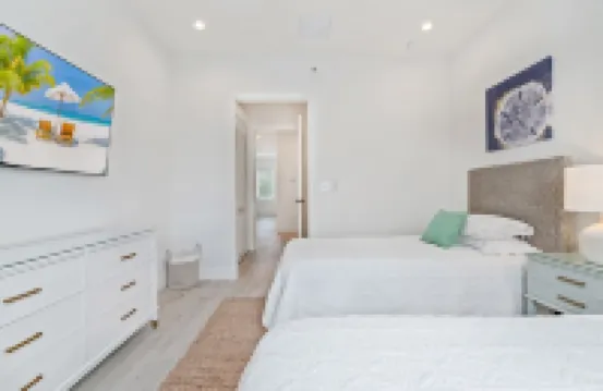 Private 7 Mile Beach Beach Club. Ocean views from Roof Terrace and Pool Pavilion