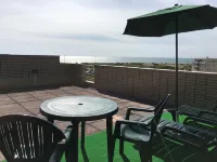 Cozy Beach Front with Rooftop