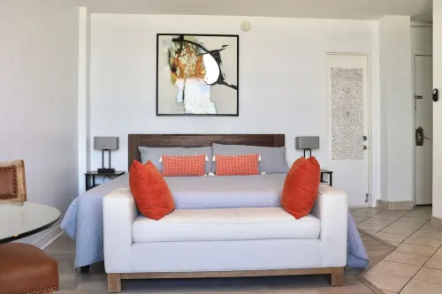 Direct Oceanfront Studio with Balcony, King Bed, Kitchenette, and Wifi