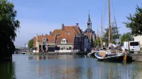 Cozy "Schwedenhaus" with a beautiful view, located on the water