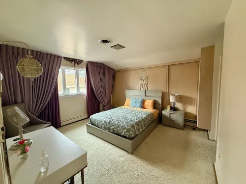 Cheerful 4-bedroom bungalow with indoor fireplace.