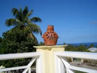 Villa with large pool, screened terrace overlooking Caribbean.