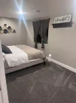 20 mins from the SLC airport spacious, clean, and cozy listing.