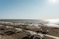 AMĀRIA Beach Resort by NOMÉE Hospitality Group - Resorts