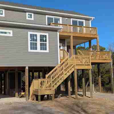 Outdoor living at its best with new construction, pet friendly and water views Hotel Exterior