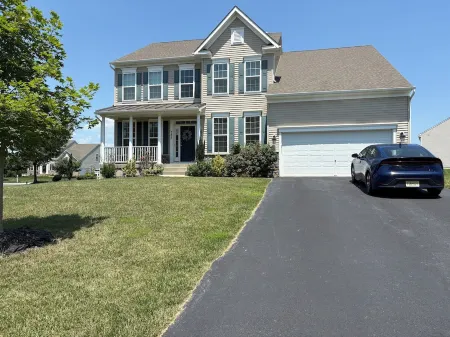 Spacious 4-bedroom house with backyard oasis