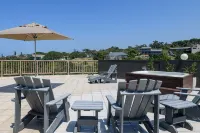 Sea View Holiday Apartment.  Walk to the Beach.  Exclusive use roof-top deck.