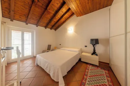 Bright penthouse on Lake Como with breathtaking view. Отели в г. Колонно