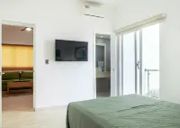 Chic 1-Bedroom Condo in Punta Cana with WiFi, AC & 1 minute walk to the Beach