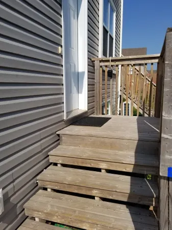 One bed apt w/ private bathroom (1) free charge (1) car parking.