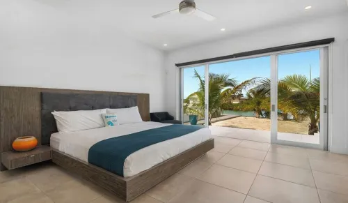 Waterfront Luxury Villa with Optional Boat and Beach Access Just Steps Away
