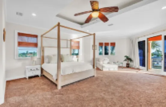 Indulge in Luxury at This Expansive Three-Story Waterfront Retreat.