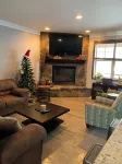 Spacious 5-bedroom, 5-bathroom townhome with WiFi, AC, Priv Hottub, ElecCharging
