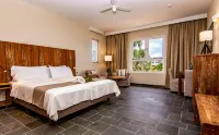 Bayside Boutique Hotel - Blue Bay Golf & Beach Resort - bar