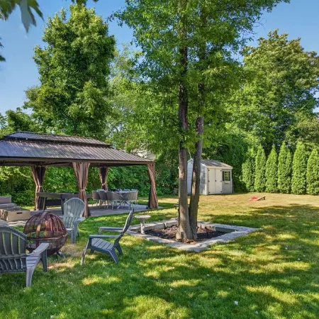 Backyard Oasis: Gazebo, Pool Table & Fire Table