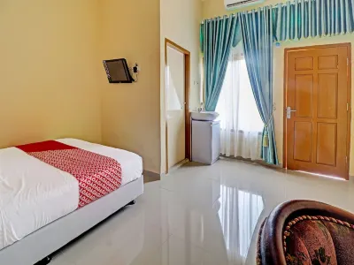 OYO 90945 Arizon Kost Hotels in Rawa Sari