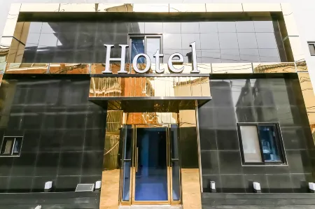 Asan Lawrence Hotel Отели рядом с достопримечательностью «Университет Сонмун»