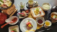 Togurakamiyamadaonsen Shunjyuan Kikusui Ryokan Hôtels à : Omi