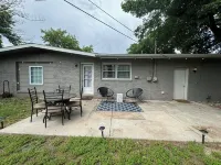 Cozy house in quiet neighborhood with hot tub, fire pit, and arcade games!