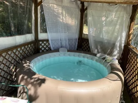 Detached cottage on property with private Jacuzzi and shared pool