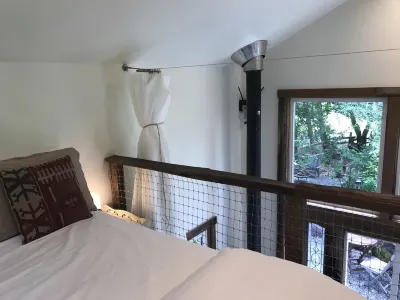 On a 40 acre estate, outdoor soaking tub,  fire pit, hammocks, pet friendly!