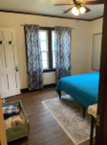 Peaceful home in town. Great location--walk downtown to stores and restaurants.