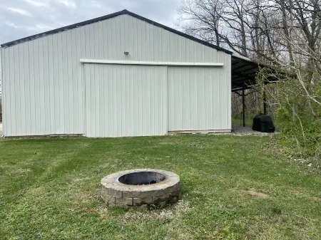 Couples' Hideaway - Relaxing barndominium with hammock, firepit, & covered patio