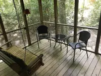 Come to the mountains to a rustic cabin by a creek.